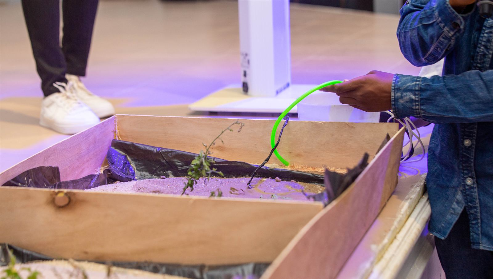 A student wiring up a prototype