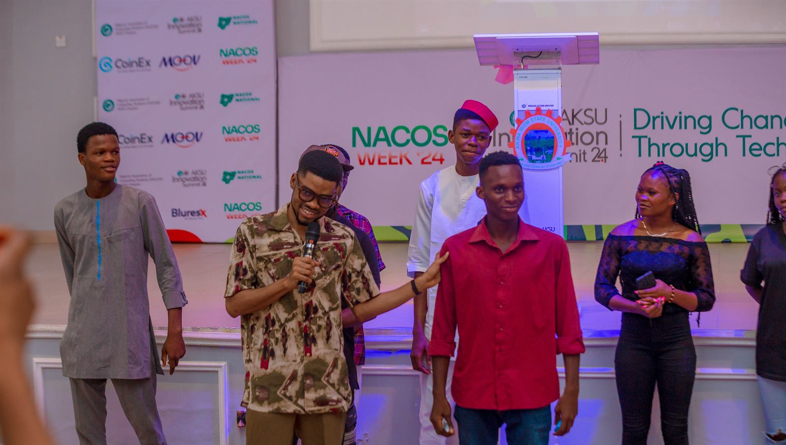 Students on stage at NACOS Week 2024