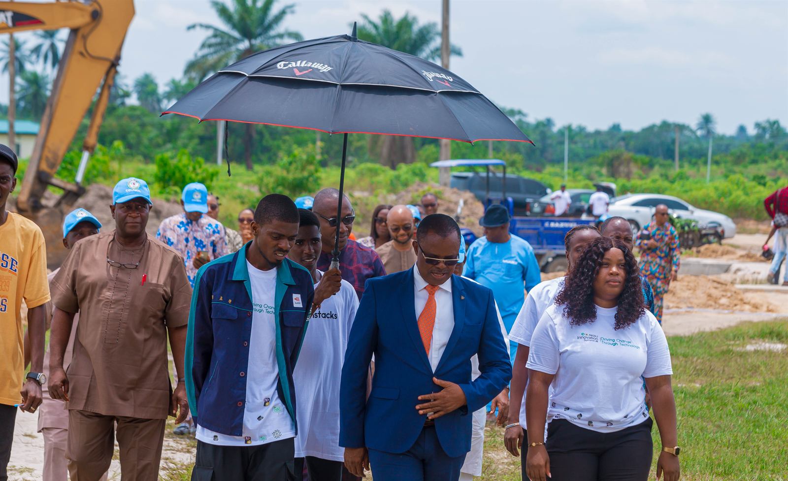 Guests walking across the campus grounds